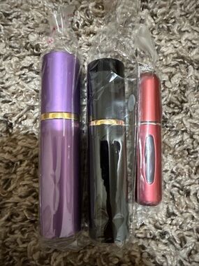 three travel perfumes atomizer